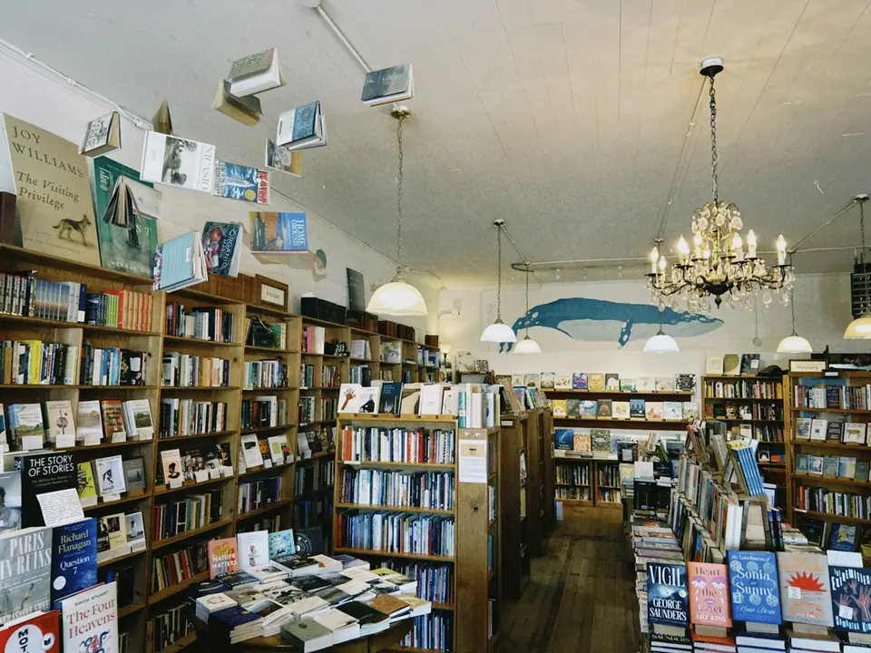 The inside of a bookshop with full bookshelves
