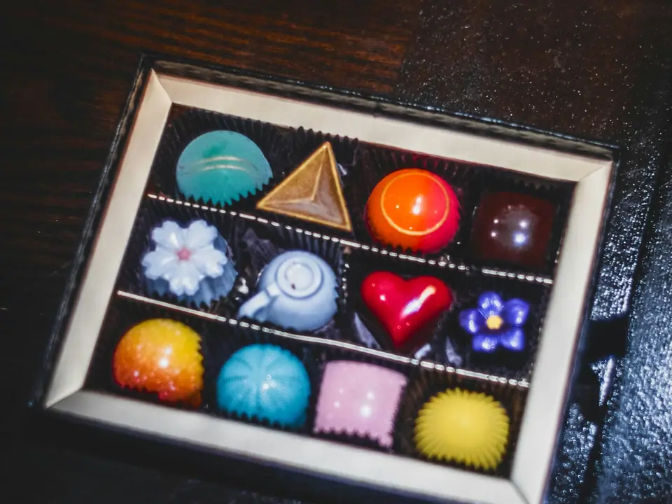 A box of assorted colorful chocolates