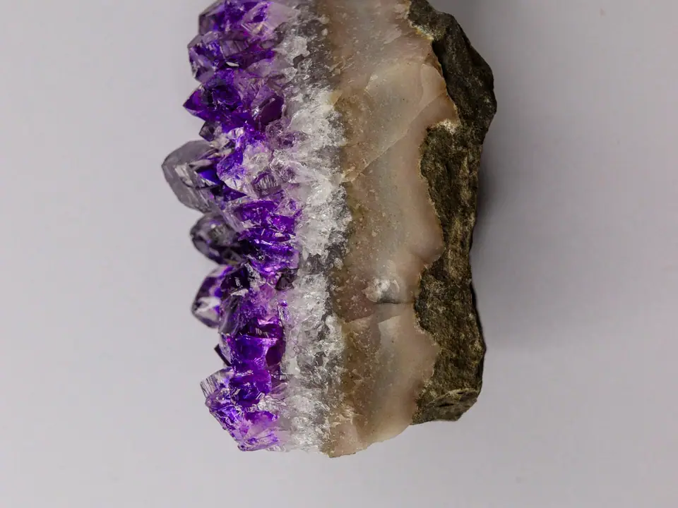 A purple amethyst crystal cluster
