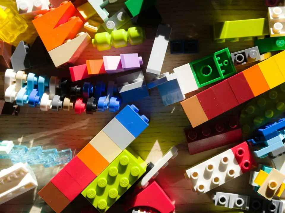 A pile of colorful plastic building bricks