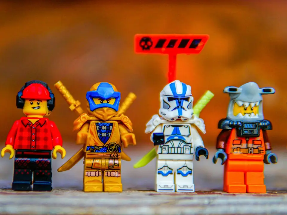 A row of colorful toy minifigures